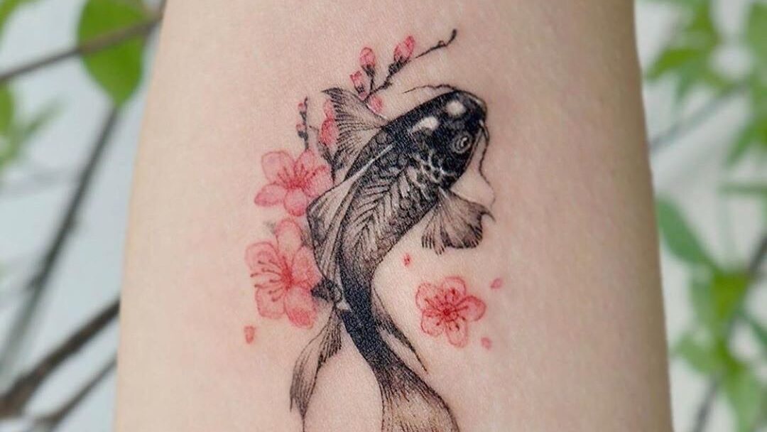yin yang koi fish tattoo female